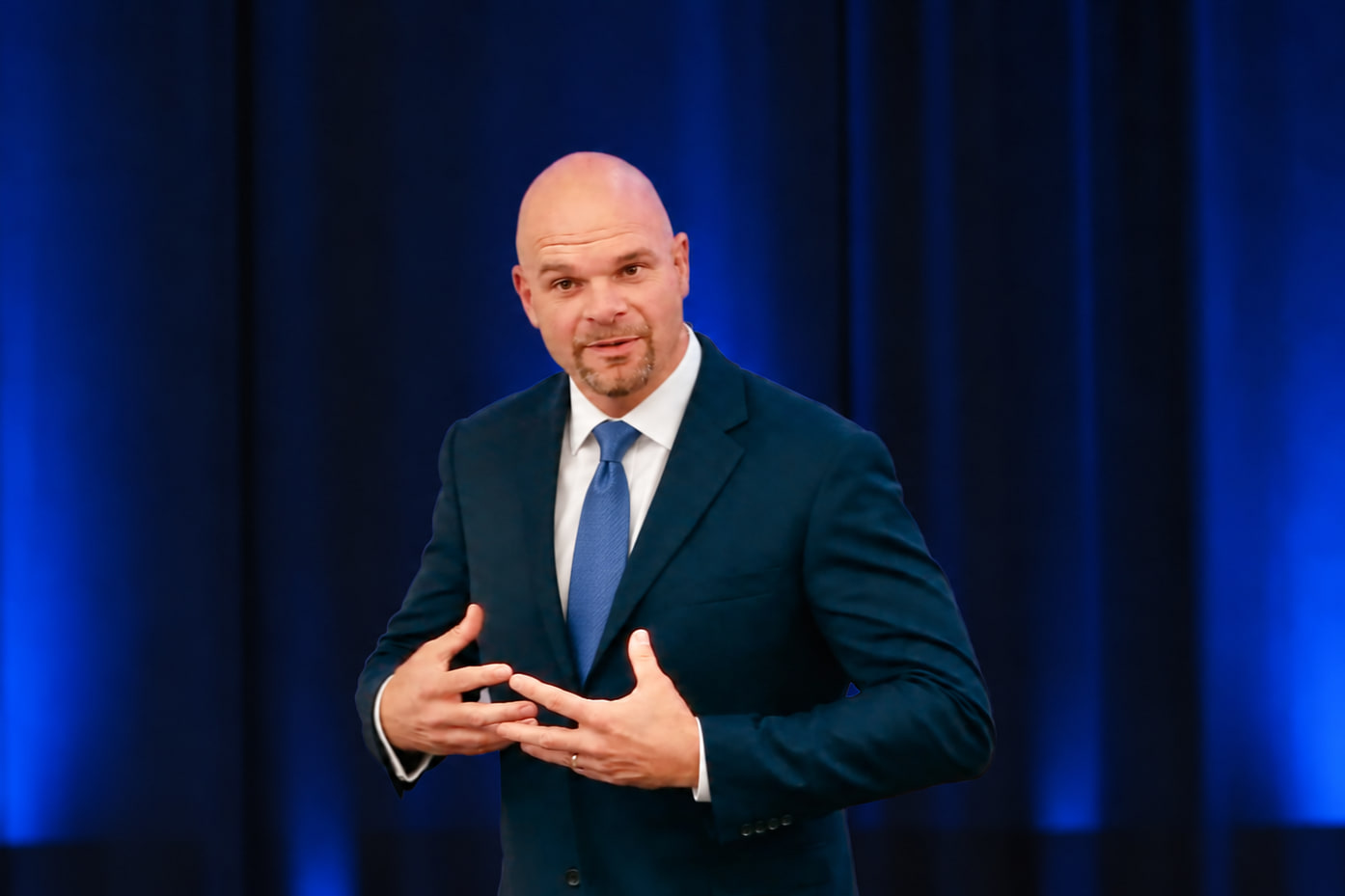 Dean Eric Smith on stage — The Capacity Crisis