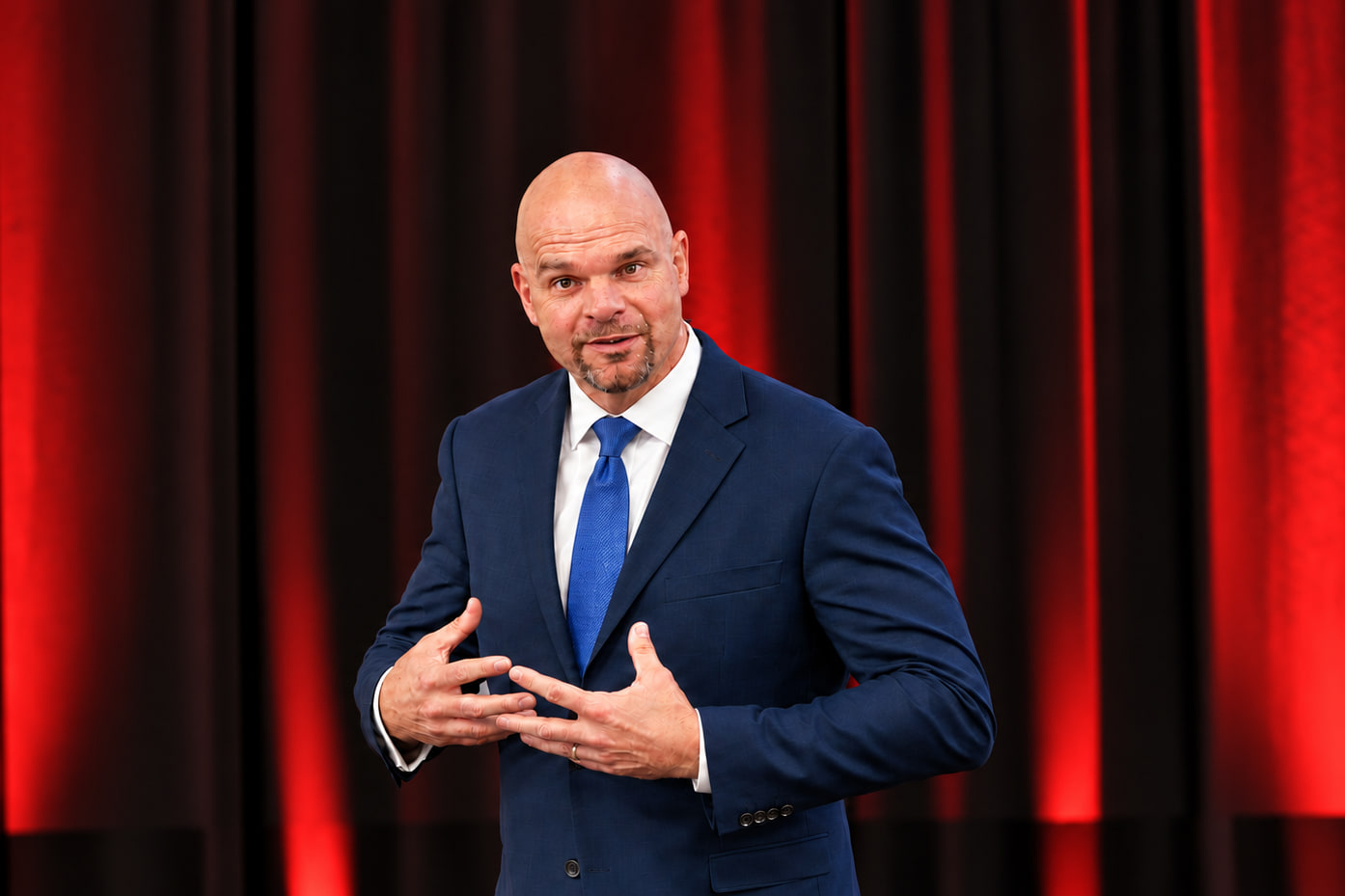 Dean Eric Smith on stage — The Capacity Crisis